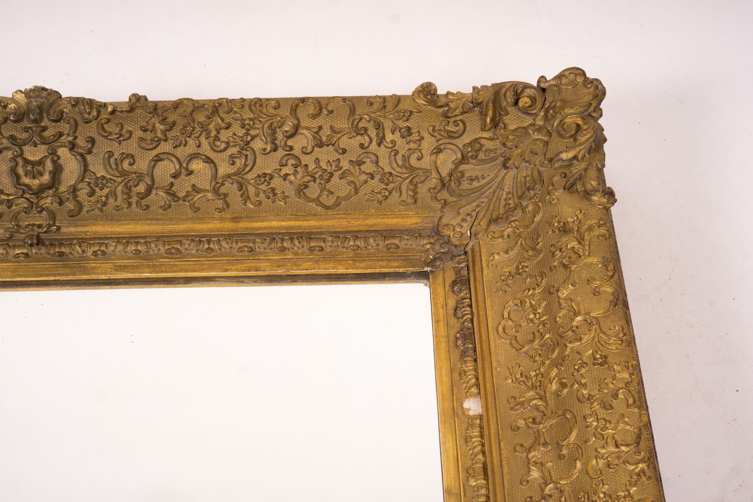 A Victorian gilt gesso wall mirror, W.104cm H.124cm